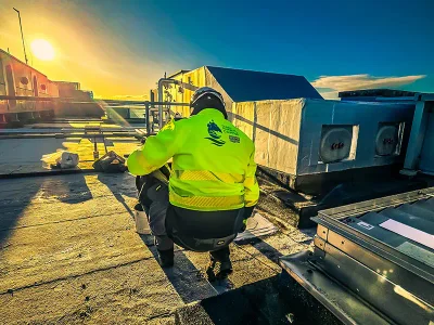 Commercial flat roof inspection with HVAC units - free assessment service