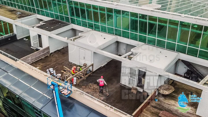 Roof cleaning and preparation before commercial waterproofing application