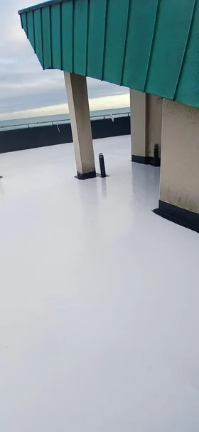 Waterproofed flat roof with green metal structure completed by Dublin Protective Coatings