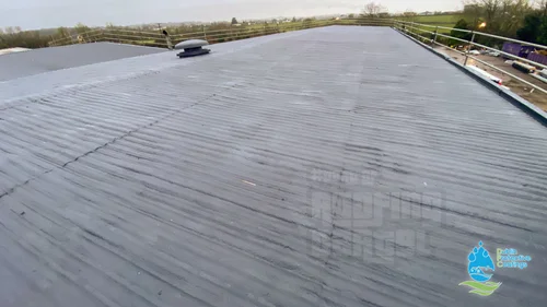 Waterproofed industrial warehouse roof in Ireland with seamless liquid rubber coating
